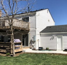 Crisp, clean lines for a beautiful two-story residential update. This project featured a complete roof and garage replacement using dimensional shingles that perfectly complement the home's modern white siding and outdoor living spaces.