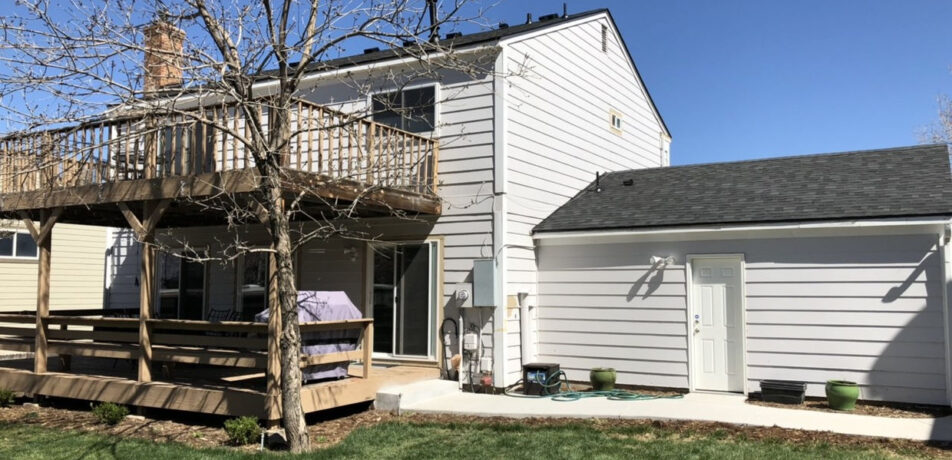 Crisp, clean lines for a beautiful two-story residential update. This project featured a complete roof and garage replacement using dimensional shingles that perfectly complement the home's modern white siding and outdoor living spaces.