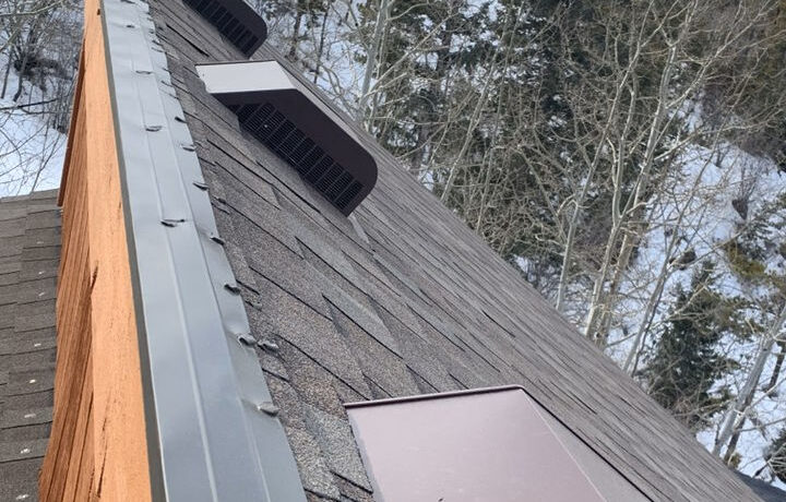 Engineered for mountain living. This high-altitude, steep-slope project utilizes advanced ventilation box vents and reinforced metal drip edges to prevent ice damming during heavy Colorado winter snows.